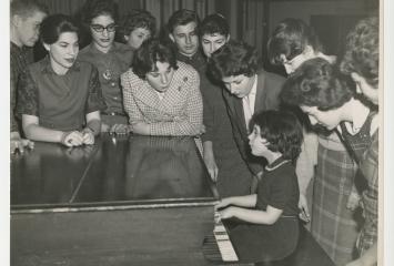 Girl at piano at the JCC in Lynn, circa 1957-1960, Jewish Community Center of the North Shore (Mass.) Records in the JHC archive.