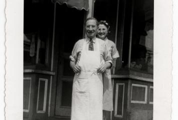 David and Becky Glassman in front of store in Chelsea, date unknown, Jewish Neighborhood Voices collection in the JHC archive.