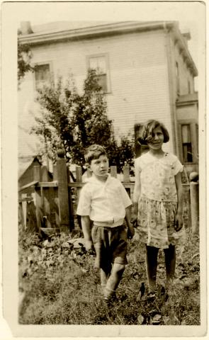 Charlotte (Stone) Shaw and Harmon Stone in garden, date unknown, Elihu Stone Papers in the JHC archive.