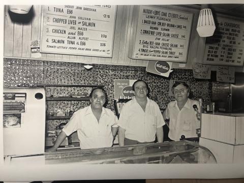 Image of men behind the counter at Murray and Eddy's deli. Courtesy of the Walnut Street Shul.