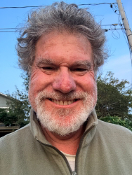 Stephen Weiner Selfie of Stephen Weiner outdoors in a quarter-zip sweater