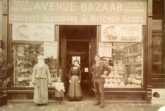 event-yiddish-yankeeland-jews-boston-11-2021.jpg Black and white photograph of family outside storefront